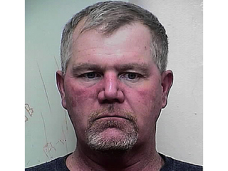 Police: Man threatened to blow up building